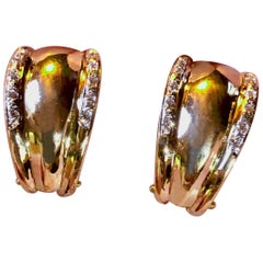 Ohrclips aus 18 Karat Gelbgold und Diamanten