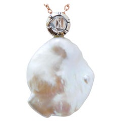 Collana con diamanti taglio vecchio da 0,87 carati, perle barocche, oro rosa e argento.