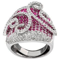 Diamond and Ruby Swirl White Gold Ring
