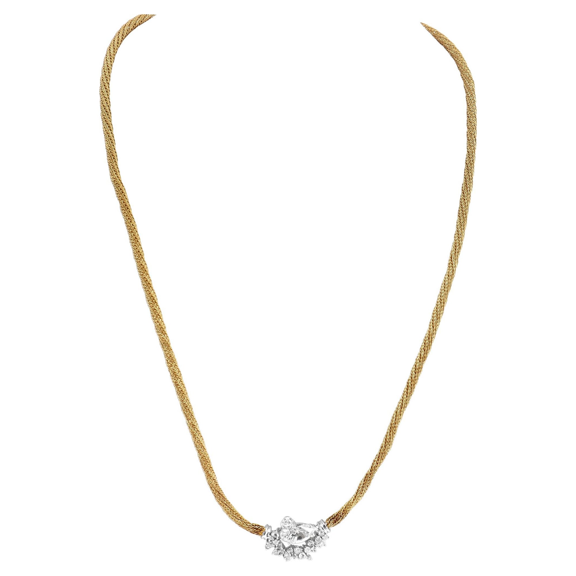 Collier en or jaune et blanc avec nid d'oiseaux