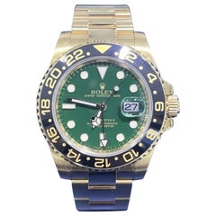 Rolex GMT-Master II GREEN Dial Black Ceramic 18K Yellow Gold 40mm Oyster 116718