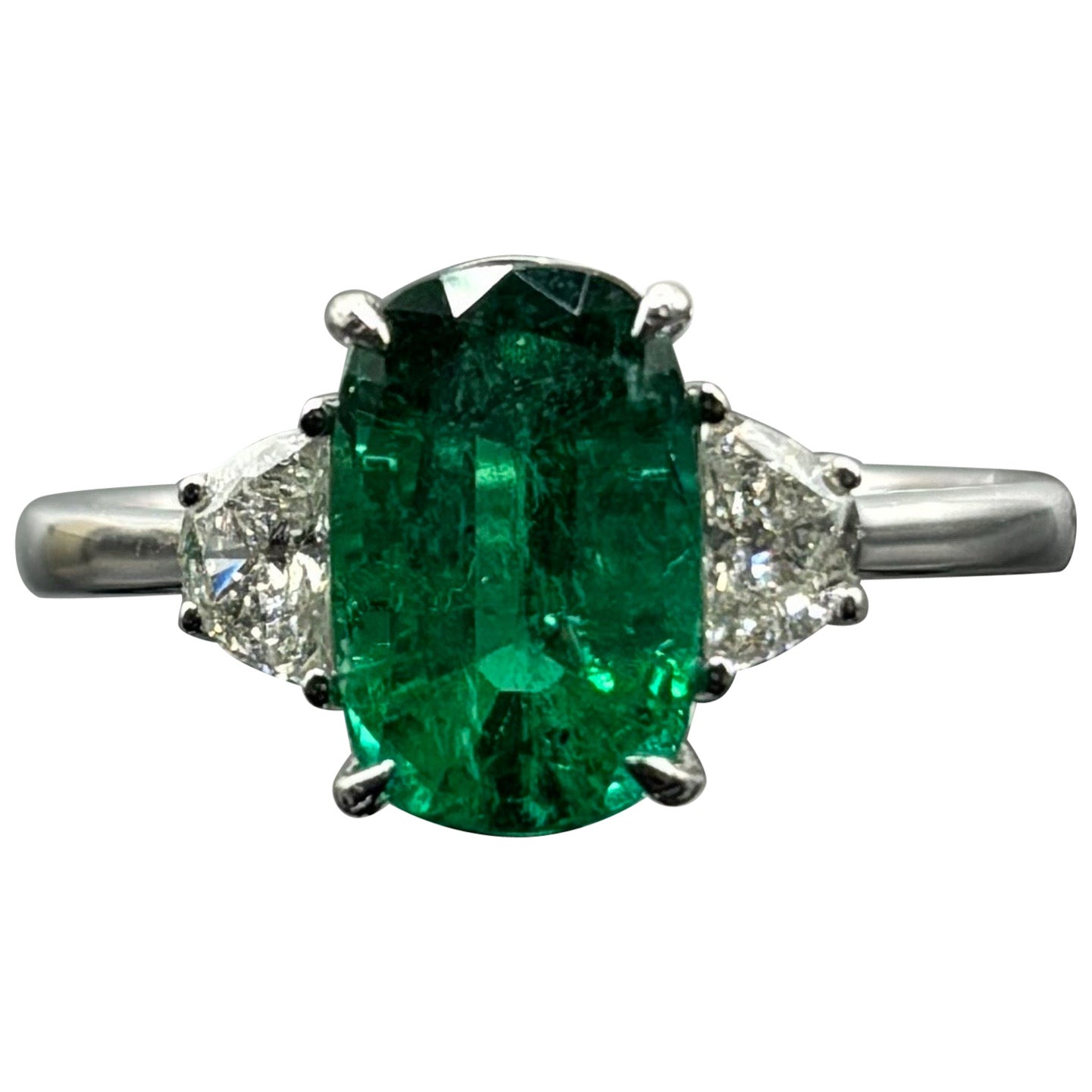 Certified 2.56 Oval Shaped Emerald and Diamond Three Stone Engagement Ring For Sale