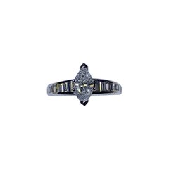 Used 2.05ct Marquise baguette diamond engagement ring in 18k white gold.