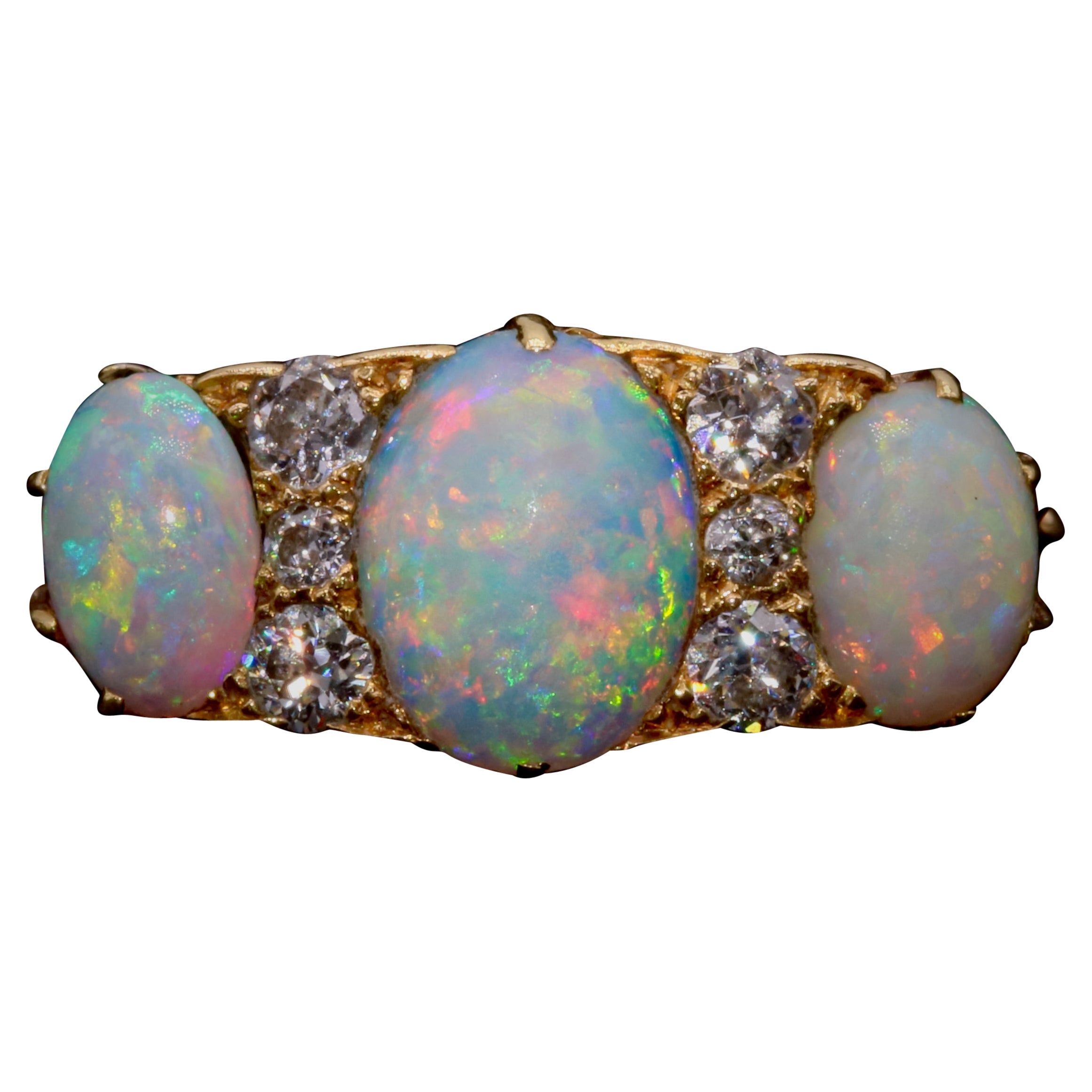 Antiguo anillo eduardiano de oro amarillo de 18 quilates con 9 piedras de ópalo y diamantes de 1,56 quilates