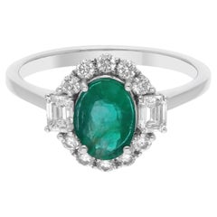 Vero anello con smeraldo dello Zambia da 0,76 carati e diamante SI/H da 0,44 carati in oro bianco 14 carati