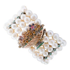 Armband aus Roségold und Silber mit Perlen, Smaragden, Rubinen, Saphiren, Diamanten, Diamanten.