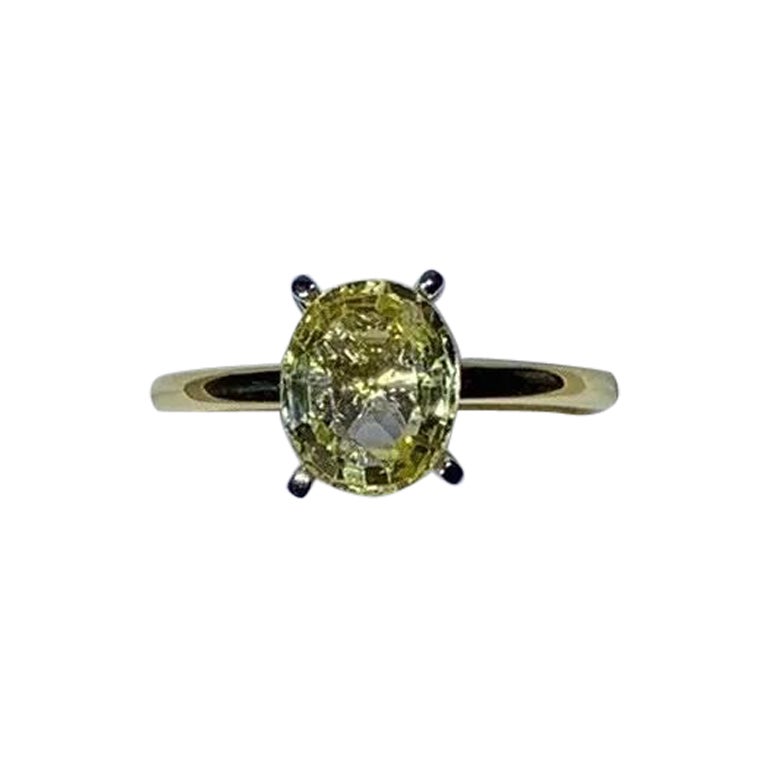 2.15ct Yellow sapphire engagement ring in 18ct yellow gold.