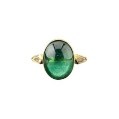 Anello di fidanzamento con smeraldo cabochon e diamante certificato in oro giallo 18 carati con finitura opaca