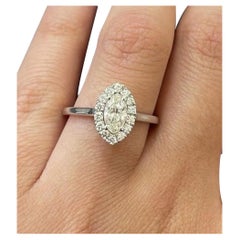 The Elegant Halo Marquise cut diamond ring