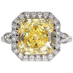 3.69 Carat GIA Certified Fancy Yellow Radiant Cut Diamond Platinum Ring