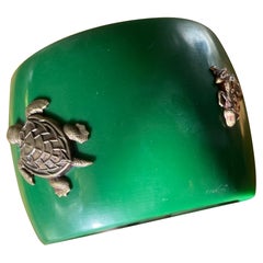 green bakelite and Menuki rigid bracelet