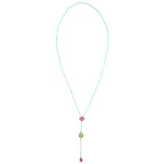 Long collier Rosario, émeraude, tourmaline, jade, étoile, rubis et or 18 carats