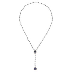 Collana in tanzanite a rosario con due cuoricini oro giallo 18 k