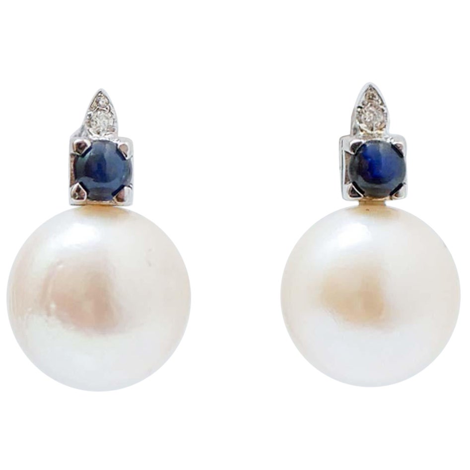 13 Mm Pearls, Sapphires, Diamonds, 14 Karat White Gold Earrings.