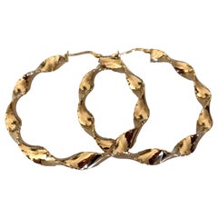Grandes boucles d'oreilles en or entièrement poinçonnées