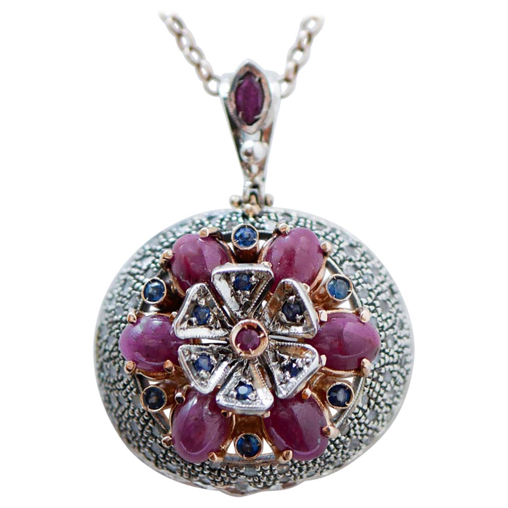 Rubies, Sapphires, Diamonds, 14 Karat Rose Gold and Silver Pendant.