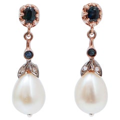 Pendientes de perlas, zafiros, diamantes, oro rosa y plata.