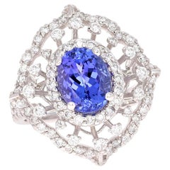 Anillo de cóctel de oro blanco de 14 quilates con diamante tanzanita de 3,83 quilates