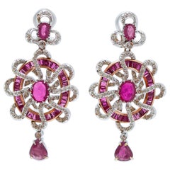 Pendientes de rubíes, diamantes, oro blanco de 14 quilates y oro rosa.