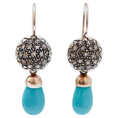 Turquoise, Diamonds, 14 Karat Gold, 9 Karat Gold and Silver Earrings.