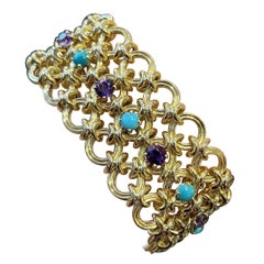 Pulsera francesa vintage de eslabones con amatista y turquesa en oro amarillo de 18 quilates