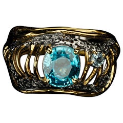 Blauer Topas mit Moissanit-Ring