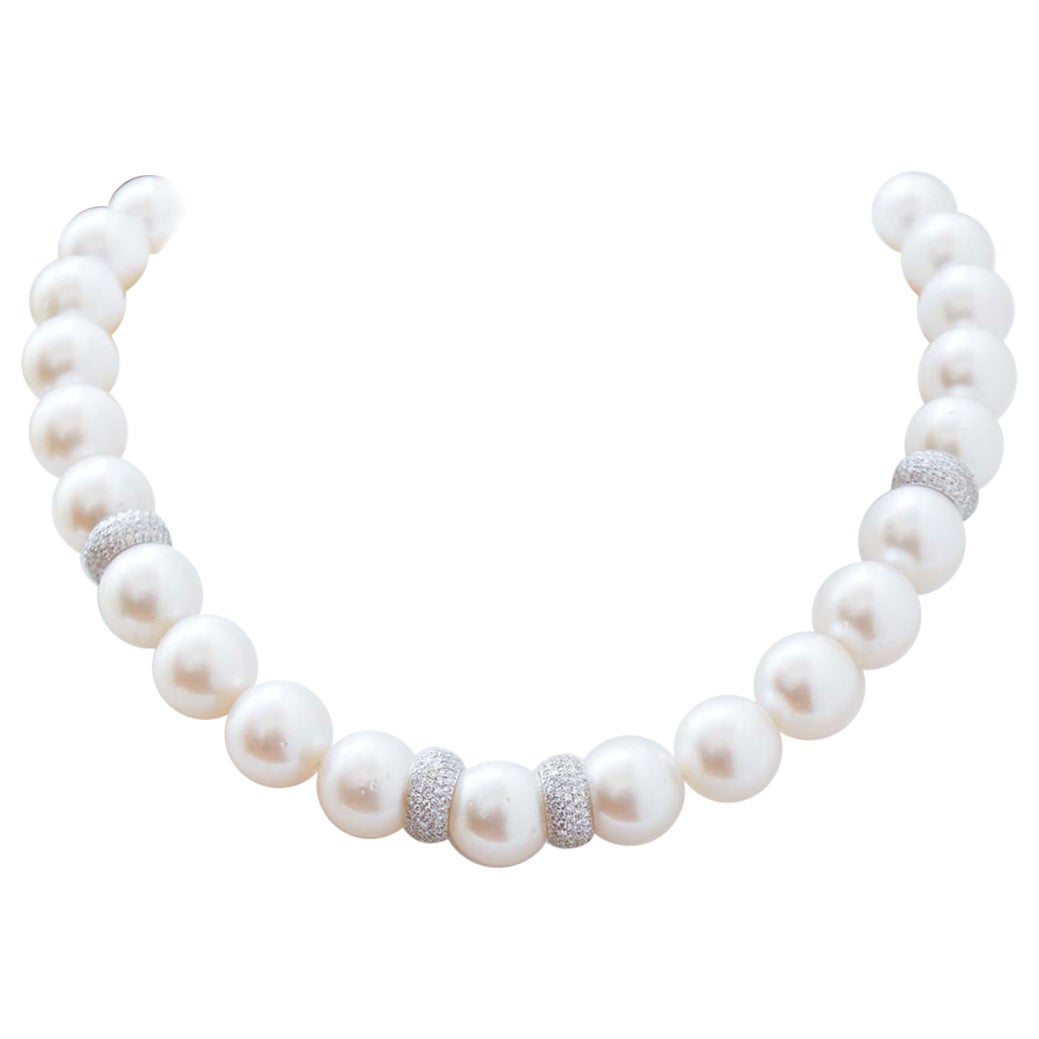 Ct 582.50 Pearls, Diamonds, 18 Karat White Gold Beaded Necklace.