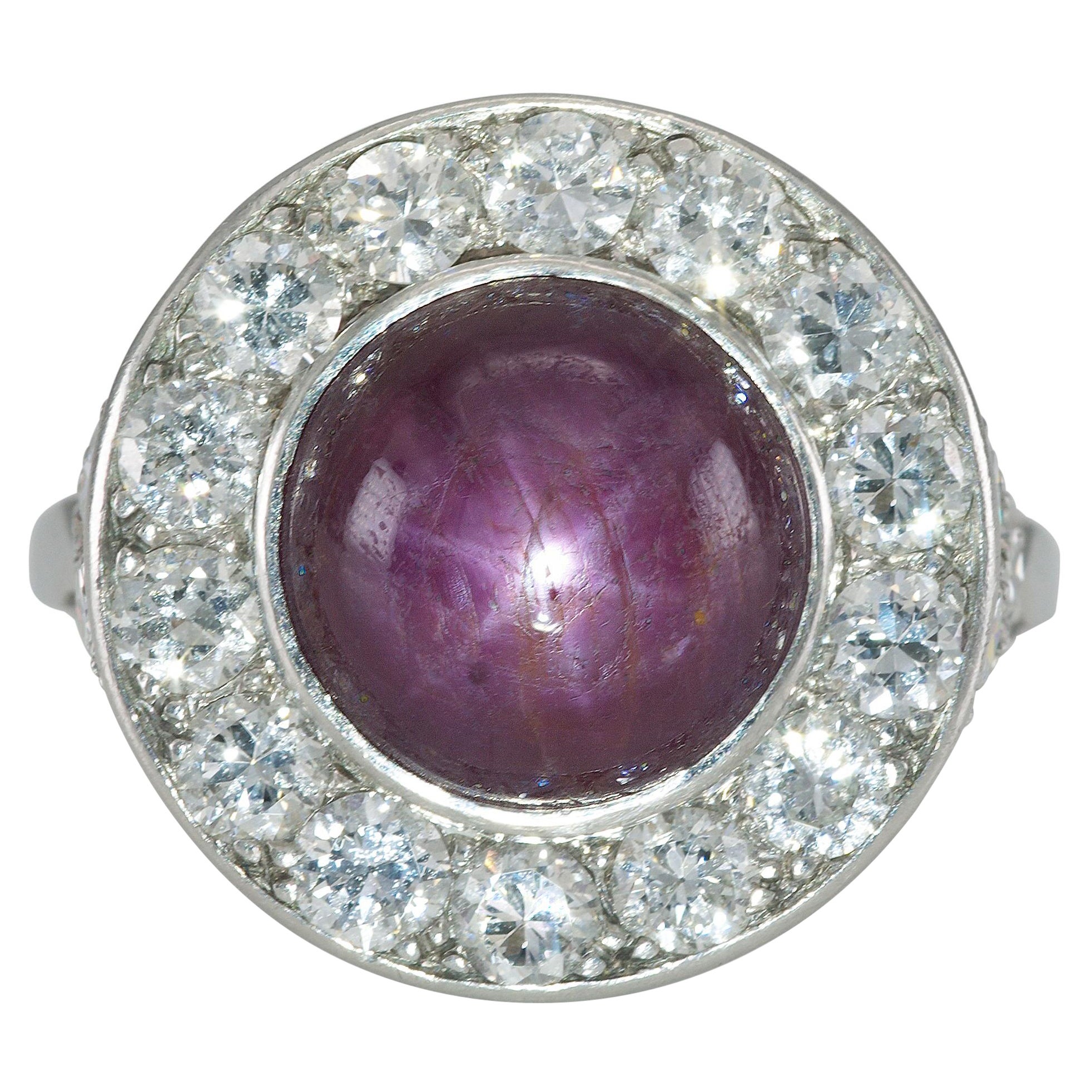Antique Art Deco 1920s 6.00 Carat Star Ruby and Diamond Halo Ring