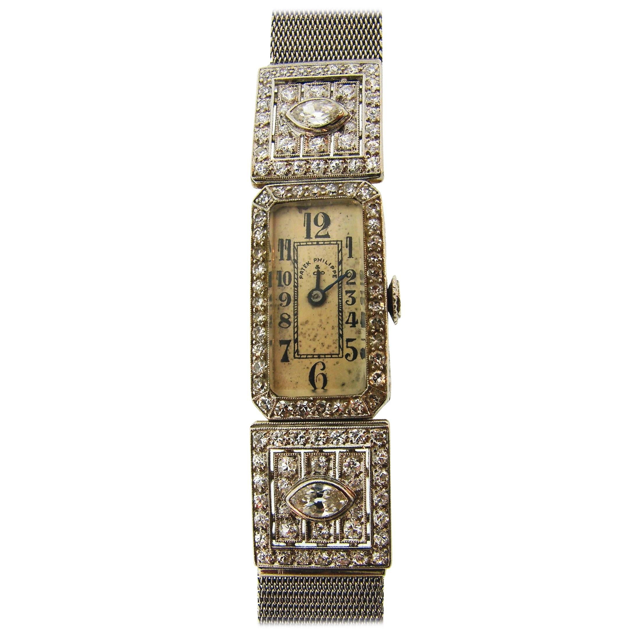 Elegant and timeless jeweled Art Deco lady's watch created by Patek Philippe in the 1930's. Delicate, feminine and wearable, it is a great addition to your jewelry collection. 
The watch is made of platinum (tested) and encrusted with marquise cut