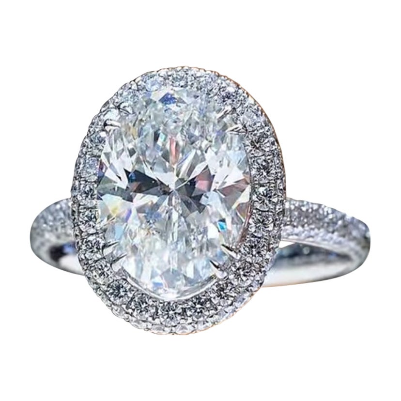 GIA Certified 5.00 Carat Oval Shape Diamond 18K Gold Ring