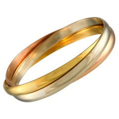 Cartier Trinity Rose, Yellow, and White Gold Bangle Bracelet