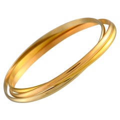 Cartier Trinity Rose, Yellow, and White Gold Bangle Bracelet