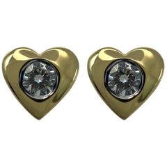 Ohrstecker in Herzform mit natürlichen runden Diamanten im Brillantschliff aus 18 Karat Gelbgold