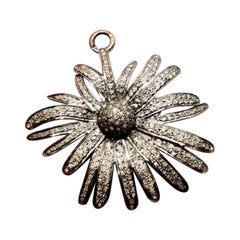 Colgante de plata 925 con diamantes en forma de flor con pavé