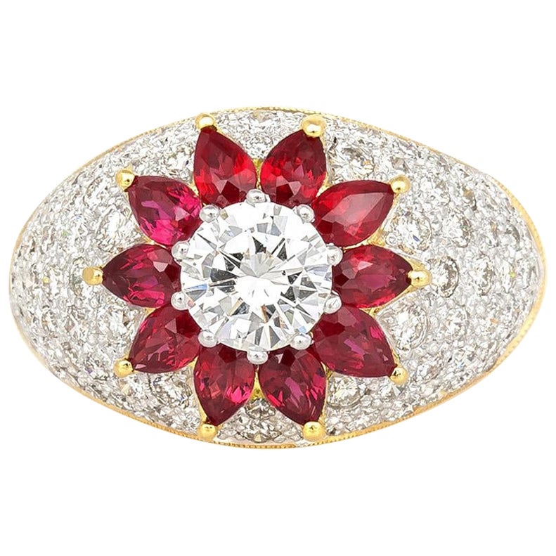 Vintage 1980s 0.80 Carat Round Brilliant Cut Diamond Flower Ring with Rubies