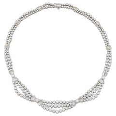 Collier de diamants taille ronde et baguette serti clos de 20,00 carats