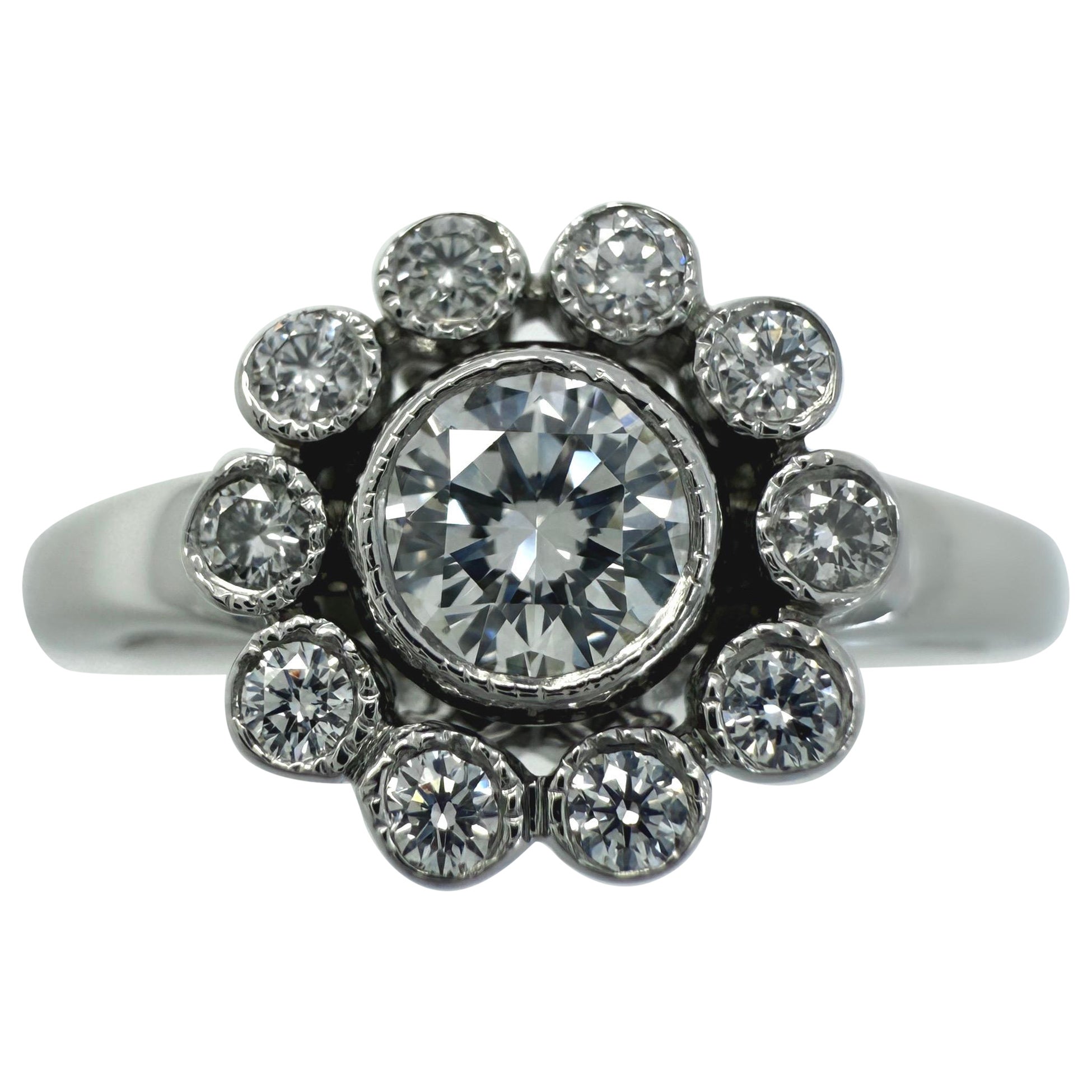 Vintage Tiffany & Co Anillo en racimo con halo de diamantes naturales en platino Flor encantada