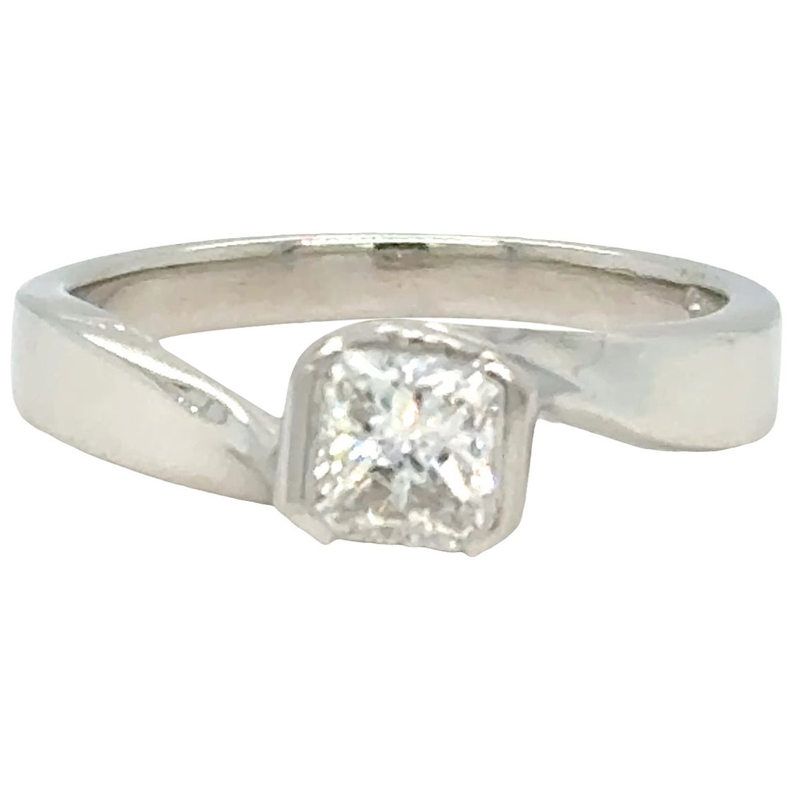 Half Carat Princess Cut Diamond Solitaire Ring Twisted Shank Design Platinum For Sale