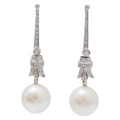 13 m Pearls, Diamonds, Platinum Earrings.