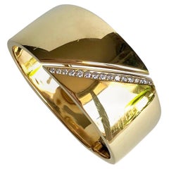 Bracelet Hermès en or jaune 18 carats et ligne de diamants