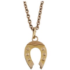 Antique Russian Imperial-era Two-color Gold Horseshoe Pendant, circa 1900