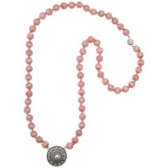 Rhodochrosite Beaded Necklace with Silver Rondelle Pendant