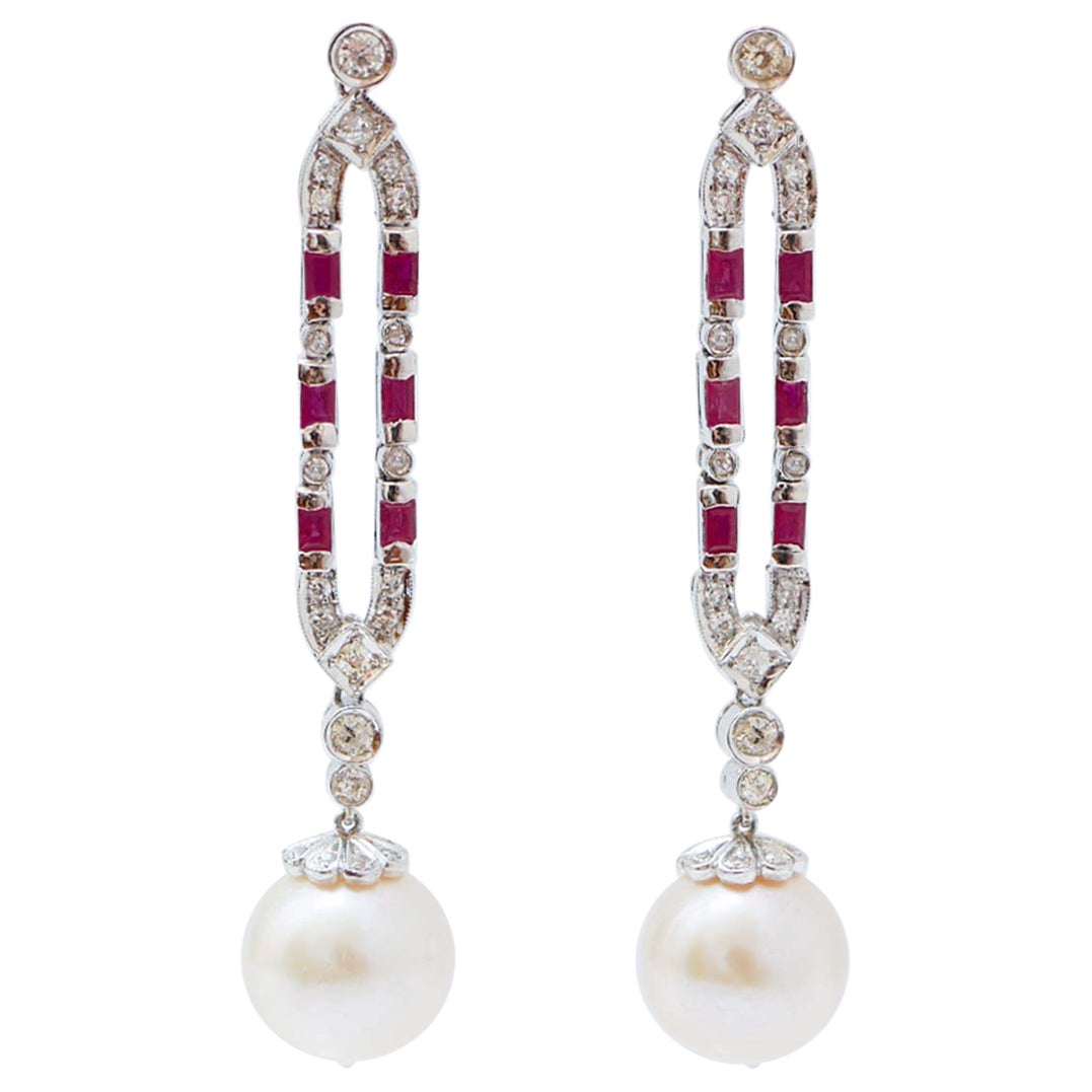 13 Mm White Pearls, Rubies, Diamonds, Platinum Earrings.