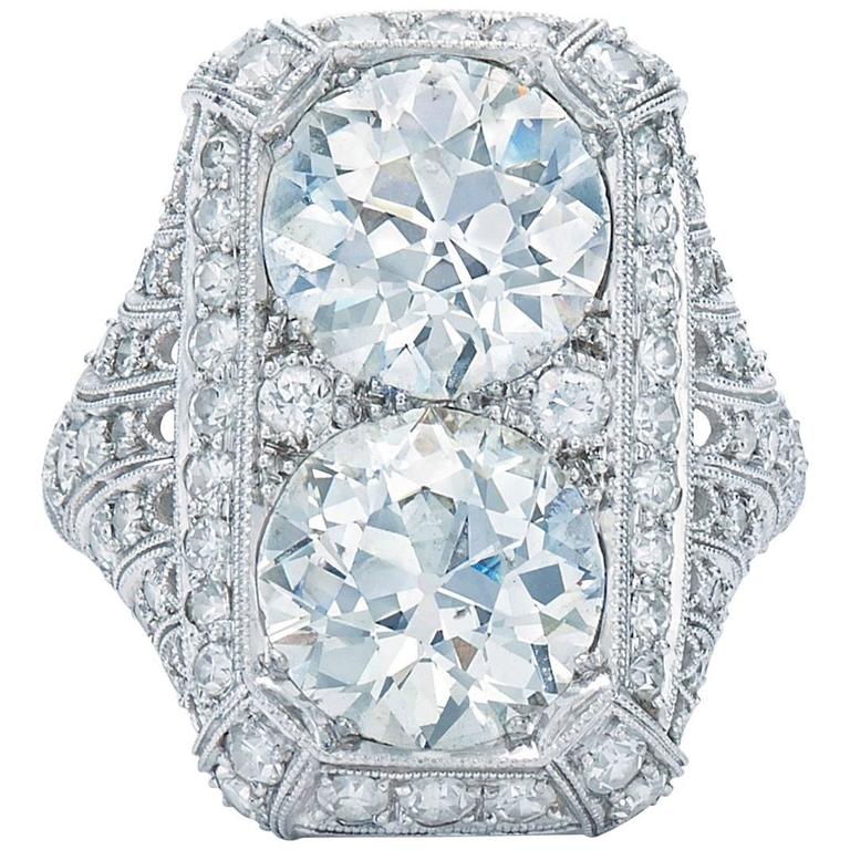 Edwardian Peacock Old European Cut Diamond Twin Stone Ring For Sale