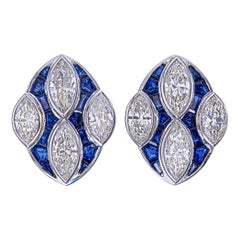 Diamond and Blue Sapphire earrings in 18 karat White Gold