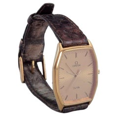 Omega De Ville men's wristwatch in brass. 1970s. Quartz movement.