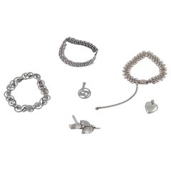 N. E. From and others. Three bracelets, one brooch, and two pendants.