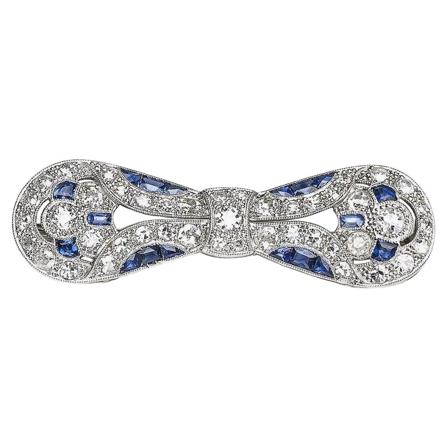 Art Deco Sapphire, Diamond And Platinum Bow Brooch, Circa 1930