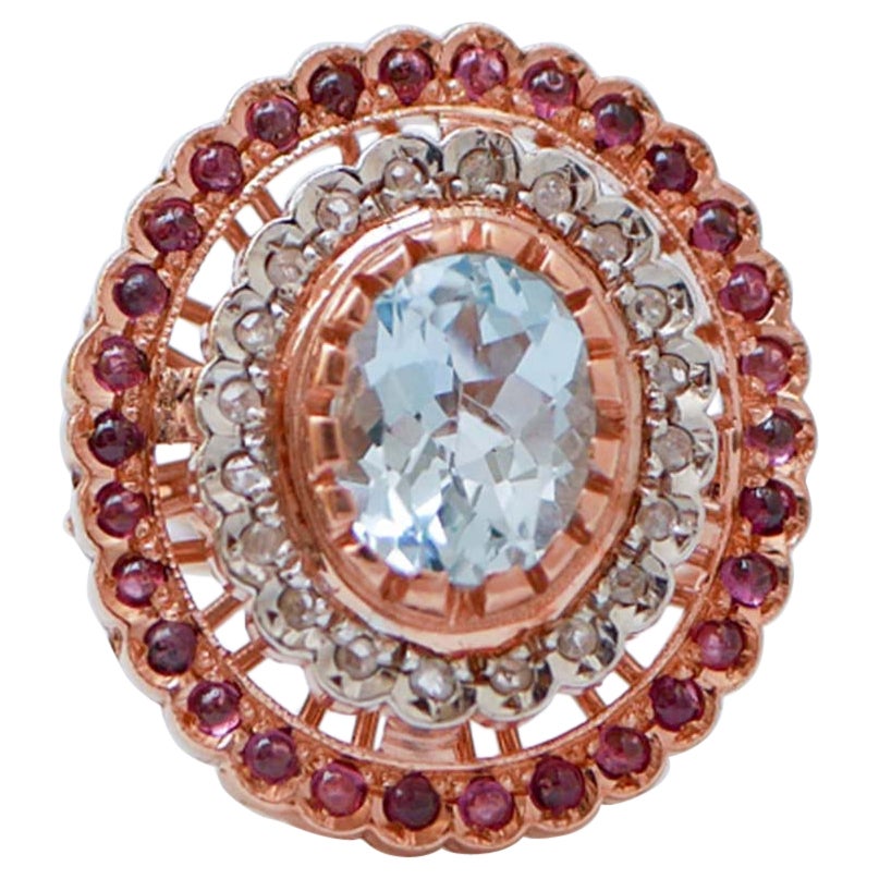 Aquamarine Colour Topaz, Garnets, Diamonds, Rose Gold and Silver Ring.