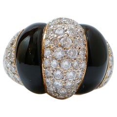 Diamonds, Onyx, 18 Karat Yellow Gold Ring.